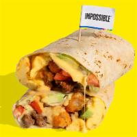 IMPOSSIBLE™ BREAKFAST BURRITO · Wake up and smell the sausage! This burrito has it all! Crumbled Impossible™ Sausage Made Fr...