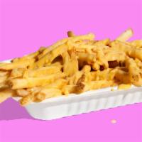 THE SHOP CHEESE FRIES · An ooey-gooey-cheesy good time. Shop Fries served with plant-based cheese sauce.