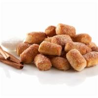 Cinnamon Sugar Pretzel Bites · Our fresh-baked Pretzel Bites are dusted with delicious cinnamon sugar.