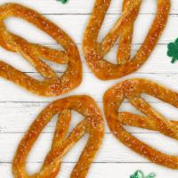 Pack of 4 Pretzels + 4 Dipping sauces!! · Four of your favorite flavors and dipping sauces. Order now and delight your friends and co-...