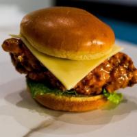 Crispy Buffalo Chicken Sandwich · Our all natural chicken breast fried in our famous breaded recipe, tossed in Buffalo sauce, ...