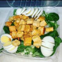 Caesar Salad · Romaine lettuce, croutons, Parmesan cheese and egg. Served with your choice of dressing. 2 d...