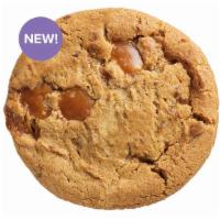 Salted Caramel Deluxe Cookie · The perfect duo, savory sea salt and sweet soft caramel make up this delicious deluxe cookie.