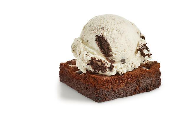 Brownie with a Scoop · One chocolate chip brownie topped with one giant scoop of ice cream. You pick the ice cream flavor.