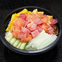 Tuna Salmon Bowl · Tuna, Salmon, cucumber, avocado, mango, tomago, seaweed salad, with spicy yuzu sauce