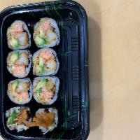Queens  Roll · Inside: Shrimp tempura, Avocado,
Spicy  kani, and Eel sauce
