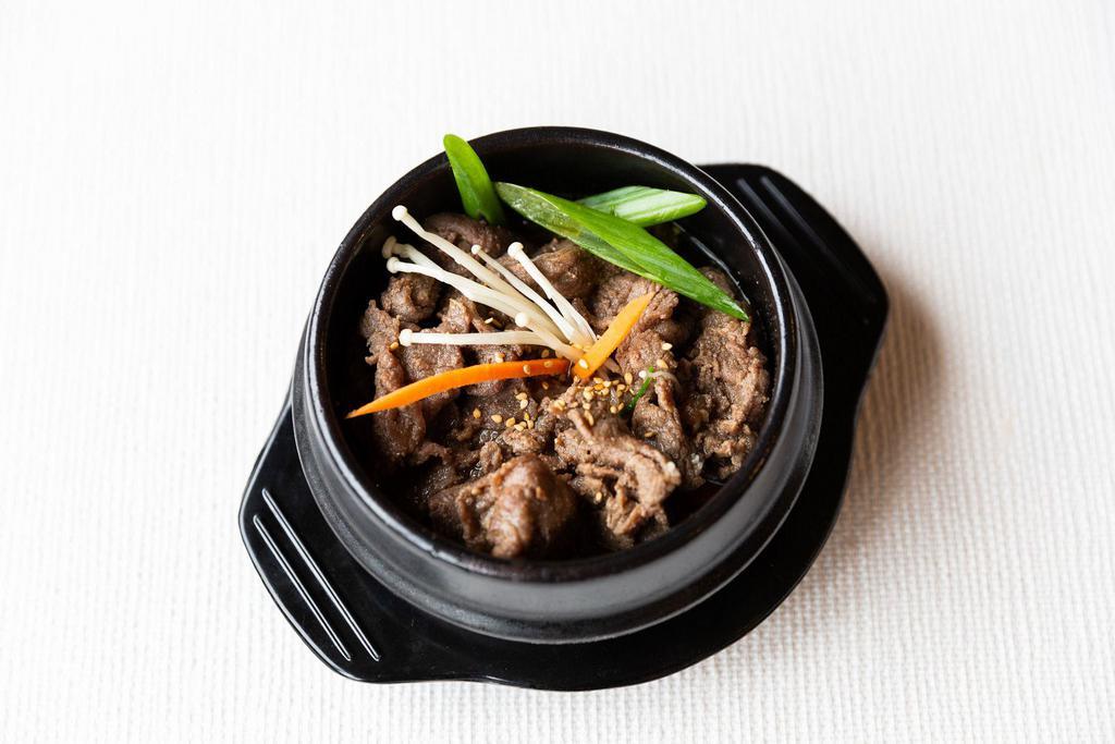 C2. Hot-Stone Bulgogi Combo  · Marinated beef stew in hot stone pot with tofu soup.