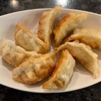Gyoza · 8 pieces. Japanese dumplings filled with chicken and vegetables. Served either fried or stea...