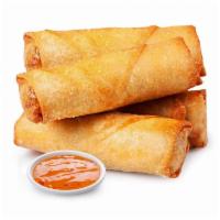 Vegetable Spring Rolls · 4 pieces of crispy rolled appetizers filled. Served with assorted vegetables. 