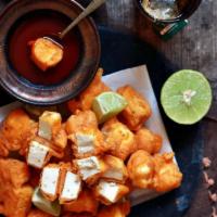 Paneer Pakoras · Marinated paneer (Indian cheese) dipped in a batter and fry making a crispy, mouthwatering a...