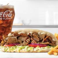 Greek Gyro Sandwich Small Meal · Lettuce, onions and tomatoes, cool tzatziki sauce and traditional gyro seasonings on our sof...