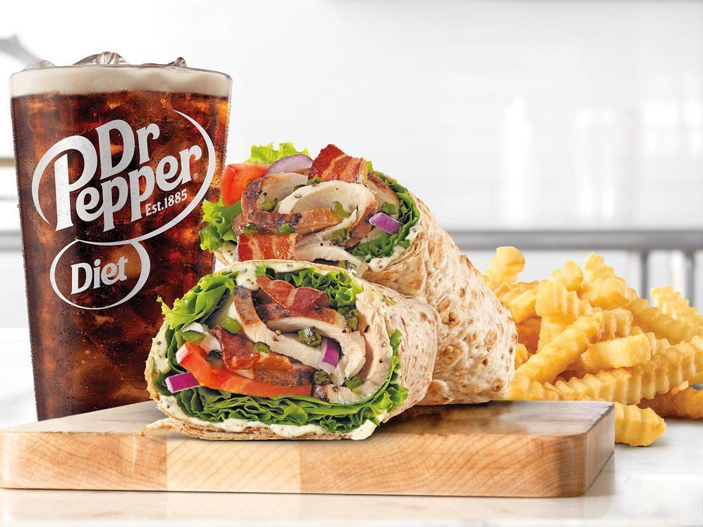 Market Fresh® Jalapeno Bacon Ranch Wrap Small Meal · Slow roasted chicken breast with pepper bacon, cheddar cheese, fire-roasted jalapenos, parmesan peppercorn ranch sauce, green leaf lettuce, red onion, and tomato in an artisan wheat wrap. Served with a drink.