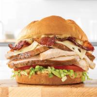 Roast Chicken Bacon & Swiss Sandwich · Slow roasted chicken with pepper bacon, Swiss cheese, lettuce, tomato, and honey mustard on ...