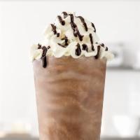 Ultimate Chocolate Shake · A rich & creamy chocolate shake made with Ghirardelli® chocolate, and topped with whipped li...