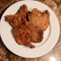 Fried Pork Chops- · 2 Bone-In Deep Fried Pork Chops. Served with 2 sides of your choice