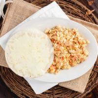 Huevos Pericos Con Arepa Con Queso · Colombian style scrambled egg with corn cake and cheese.