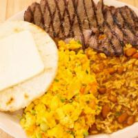 Calentado bucaros · Mixed rice and beans, steak, eggs and corn cake with cheese.