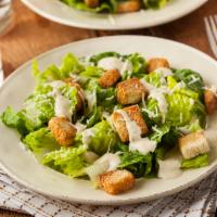 Kale Caesar Salad · Baby kale, 7-grain croutons, Parmigiano, and caesar's dressing