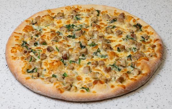 Chicken Alfredo Pizza · Alfredo Sauce, Chicken, Spinach, Mozzarella Cheese.