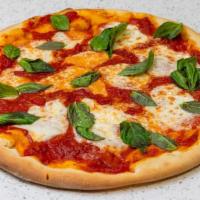 Margherita Pizza · Marinara Sauce, Fresh Mozzarella Cheese, Basil.