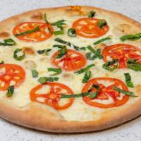 Rustica Pizza · Garlic Sauce, Fresh Mozzarella, Tomatoes, Basil.