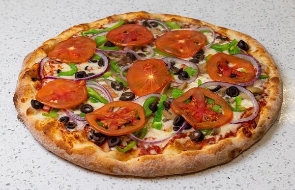 Veggie Pizza · White or Pizza Sauce, Mozzarella Cheese, Mushrooms, Onions, Tomatoes, Peppers, Olives.

