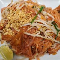 6. Pad Thai  · Stir fried thin rice noodles with egg, bacon, bean sprouts, and green onion, topped with cru...