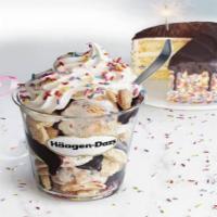 Birthday Cake Dazzler Sundae · Birthday Cake ice cream layered with hot fudge and vanilla cookie pieces topped with whipped...