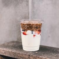 Yogurt Parfait · Nonfat Greek yogurt served with granola, strawberries and blueberries.