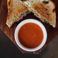 Fancy Grilled Cheese · Cheddar and provolone, tomato and a house made pesto on sourdough - choice of side.