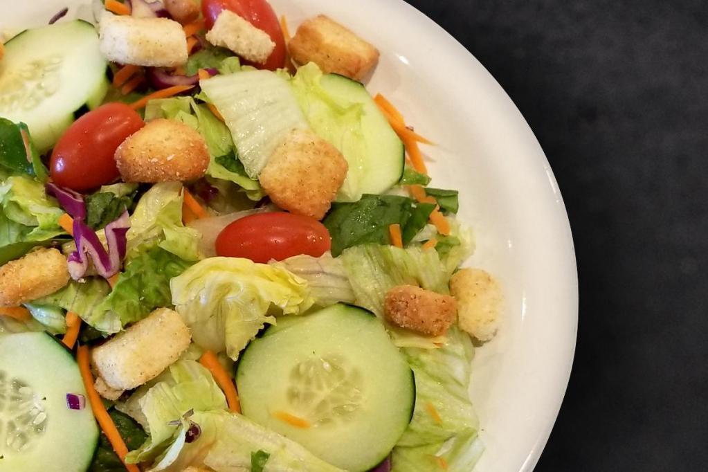 Garden Salad · Fresh NEW Round Table salad blend with grape tomatoes, cucumbers, croutons, and your choice of dressing.