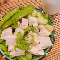 Organic Tofu Bowl Poke · Organic tofu, cilantro, sweet onion  , cucumber, edamame, avocado and sweet chili. Spicy.