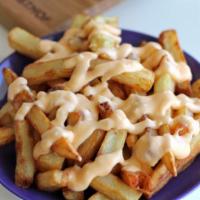 Cheese Fries · Fried potatoes topped with cheese and chili.
