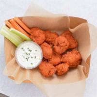 8 Crispy Boneless Wings · 8 crispy, boneless chicken wings fried to perfection. Served with celery and carrots sticks ...