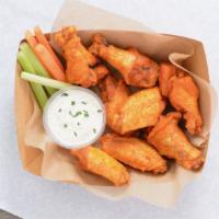 8 Classic Bone-In Wings · 8 Classic bone-in chicken wings tossed in 1 wing flavor and served with fresh carrot & celer...