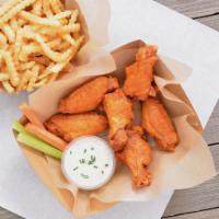 #3. Six Bone in Wing Combo · Served with carrot & celery sticks, fries and dipping sauce.