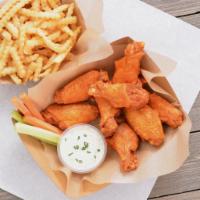#4. Eight Bone in Wing Combo · Served with carrot & celery sticks, fries and dipping sauce.