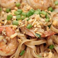 Shrimp Pad Thai · Thai noodle dish with rice noodles pan fried with bean sprouts, egg, onion, scallion and cru...