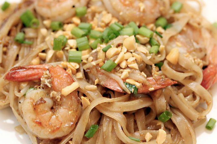 Shrimp Pad Thai · Thai noodle dish with rice noodles pan fried with bean sprouts, egg, onion, scallion and crushed peanut.
