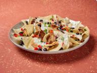 Nachos · Your choice of protein along with beans, Moe's famous queso and pico de gallo. Protein optio...