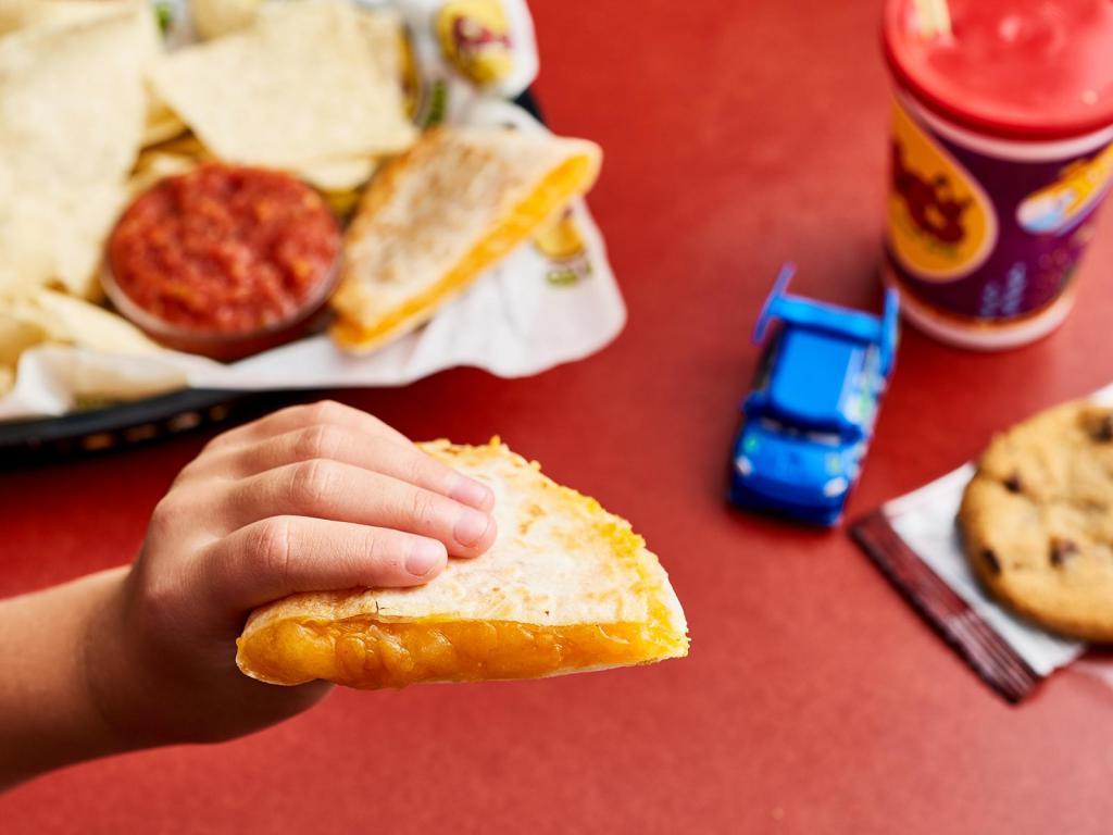 Kids Mini Masterpiece Quesadilla · Our kid-sized cheese quesadilla. Plus, every kids' meal includes a cookie, a kid-sized drink and free chips and salsa!