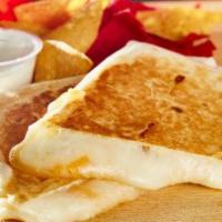 Cheesy Quesadilla Specialty · Mozzarella, mixed cheese, Cheddar, and pepper jack.