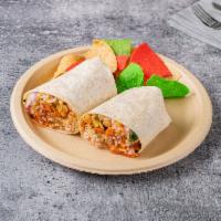 Veggie Burrito Specialty · Rice, beans, fajita veggies, mild salsa, melted mixed cheese, sour cream, and pico de gallo.