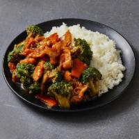 67. Chicken with Broccoli · Served with white rice.