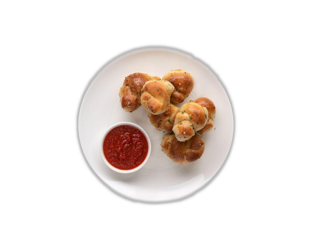 8 Piece Garlic Knots  · Freshly baked with savory blend of fresh garlic, virgin olive oil, oregano & parsley finished with Parmesan. 
