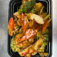 S15. Seafood Triple Delight · Jumbo shrimp, crab meat, scallop and vegetable with garlic sauce. Hot and spicy.