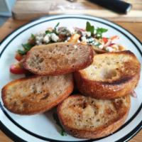 Grilled Bread · Like a little extra? Try this delicious ciabatta bread from Grand Central Bakery, grilled wi...