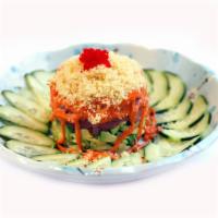 115. Volcano · Lobster salad over tuna and avocado, top with spicy mayo, tempura crunchy and red tobiko.