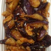 97c. Chicken with Eggplant · With white rice.