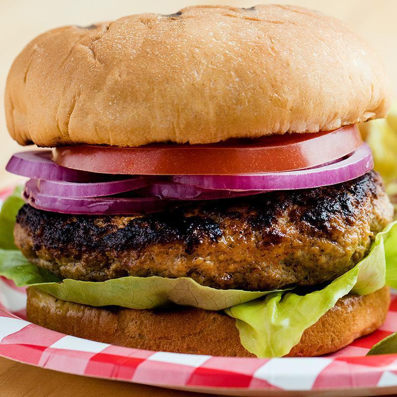 7. The Turkey Burger · Turkey patty with lettuce, tomato American cheese, mayo, ketchup.